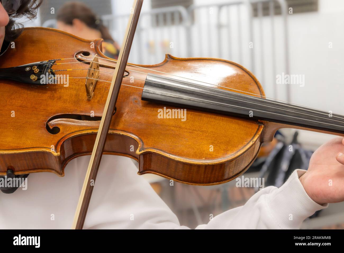 Real life young music students during rehearsals. Musical instruments