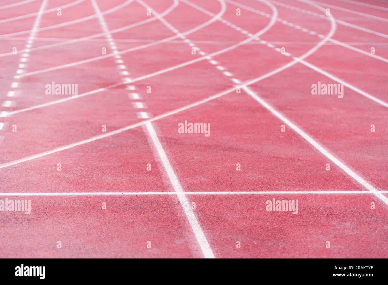 Markings from curve and straight crossed lines on running track with