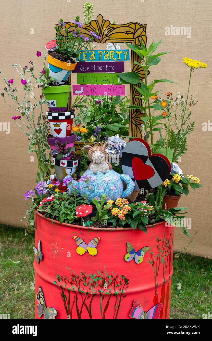 East Molesey, Surrey, UK. 3rd July, 2023. The Pollinator Tea Party display by pupils at Knaphill School at the RHS Hampton Court Garden Festival in the grounds of Hampton Court Palace. This year is the 30th Anniversary of the Festival and it will be taking place from 4th July to 9th July. Credit: Maureen McLean/Alamy Stock Photo