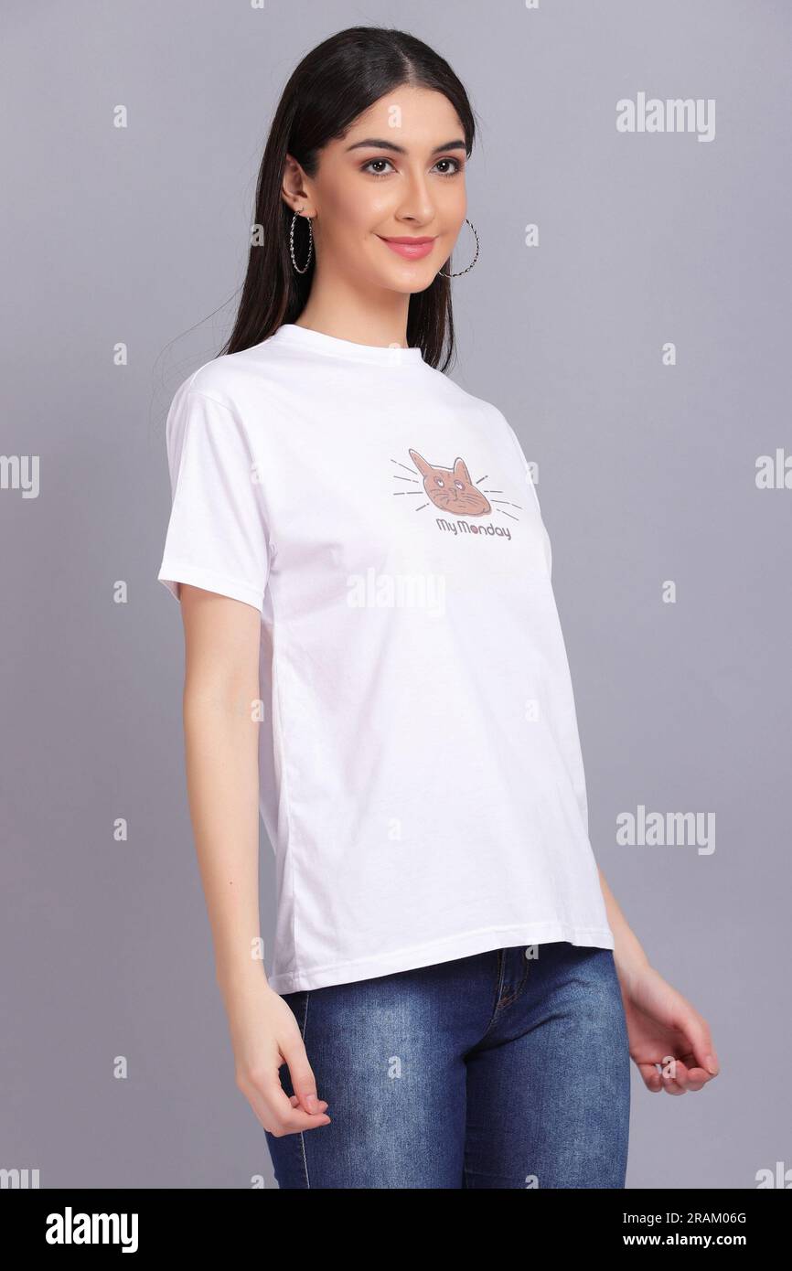 Female Model Wearing T-shirt and Jeans Stock Photo