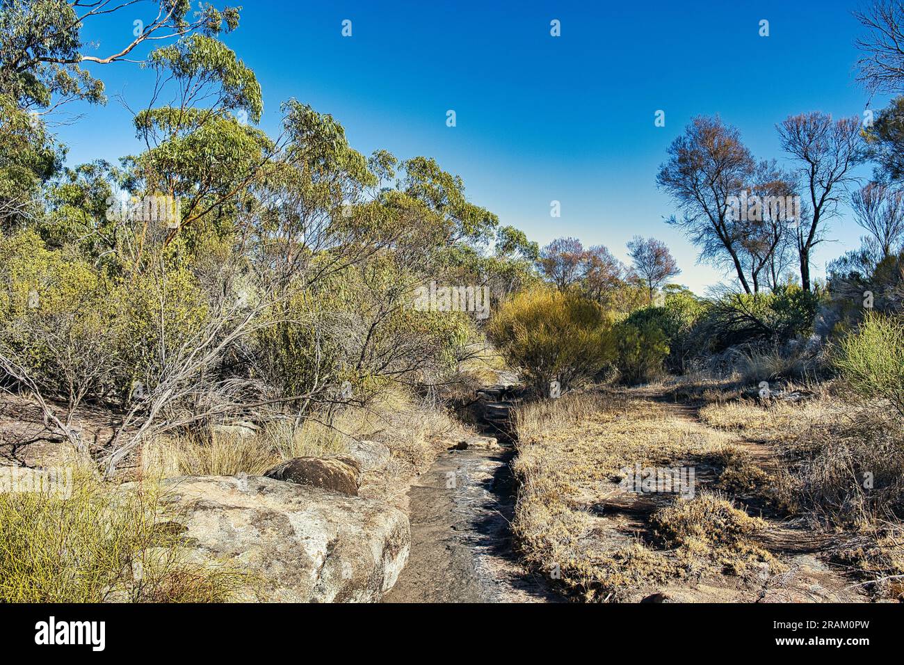 Outback Goldfields Water catchment channel hewn out in granite at in the Western ...