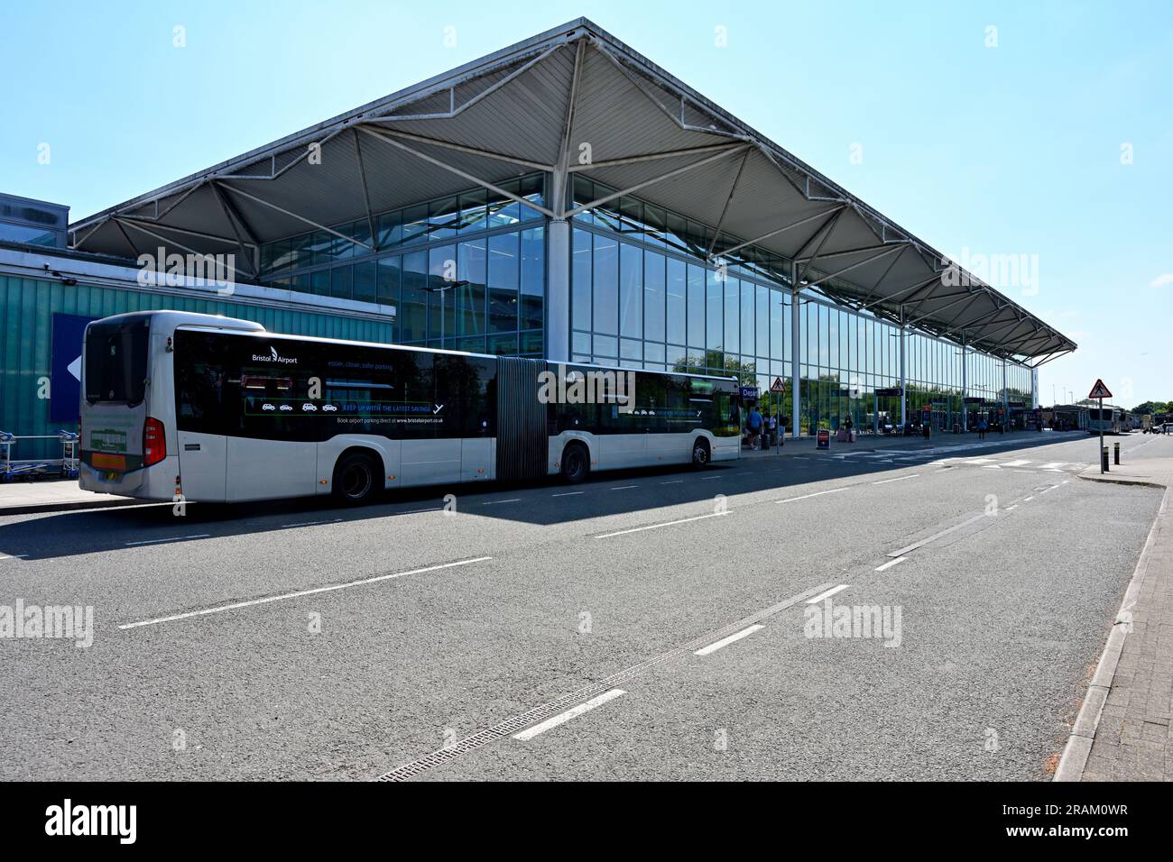 Outside Bristol airport with departure entrance and shuttle bus from