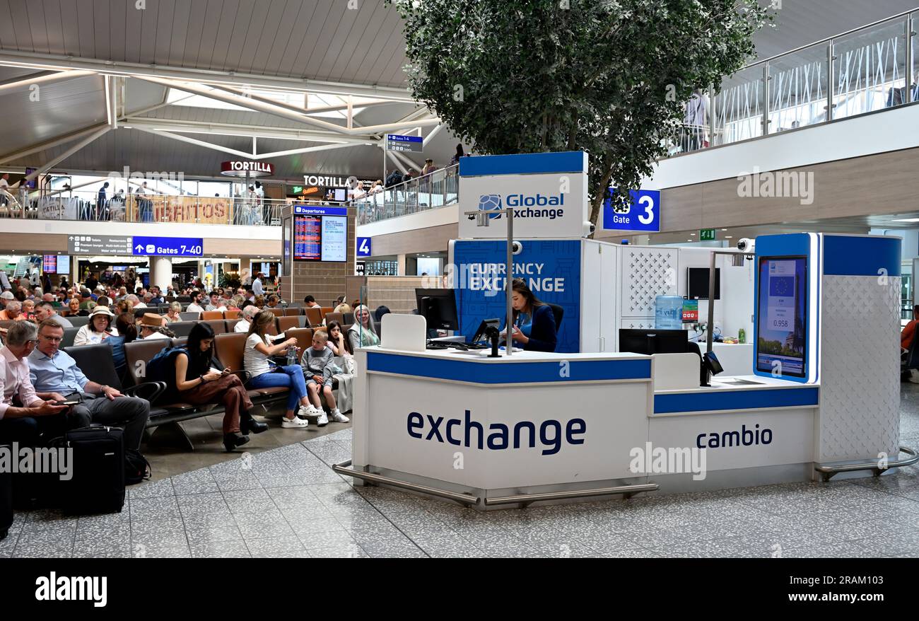 Currency exchange for travel in airport arrivals / departure area Stock Photo