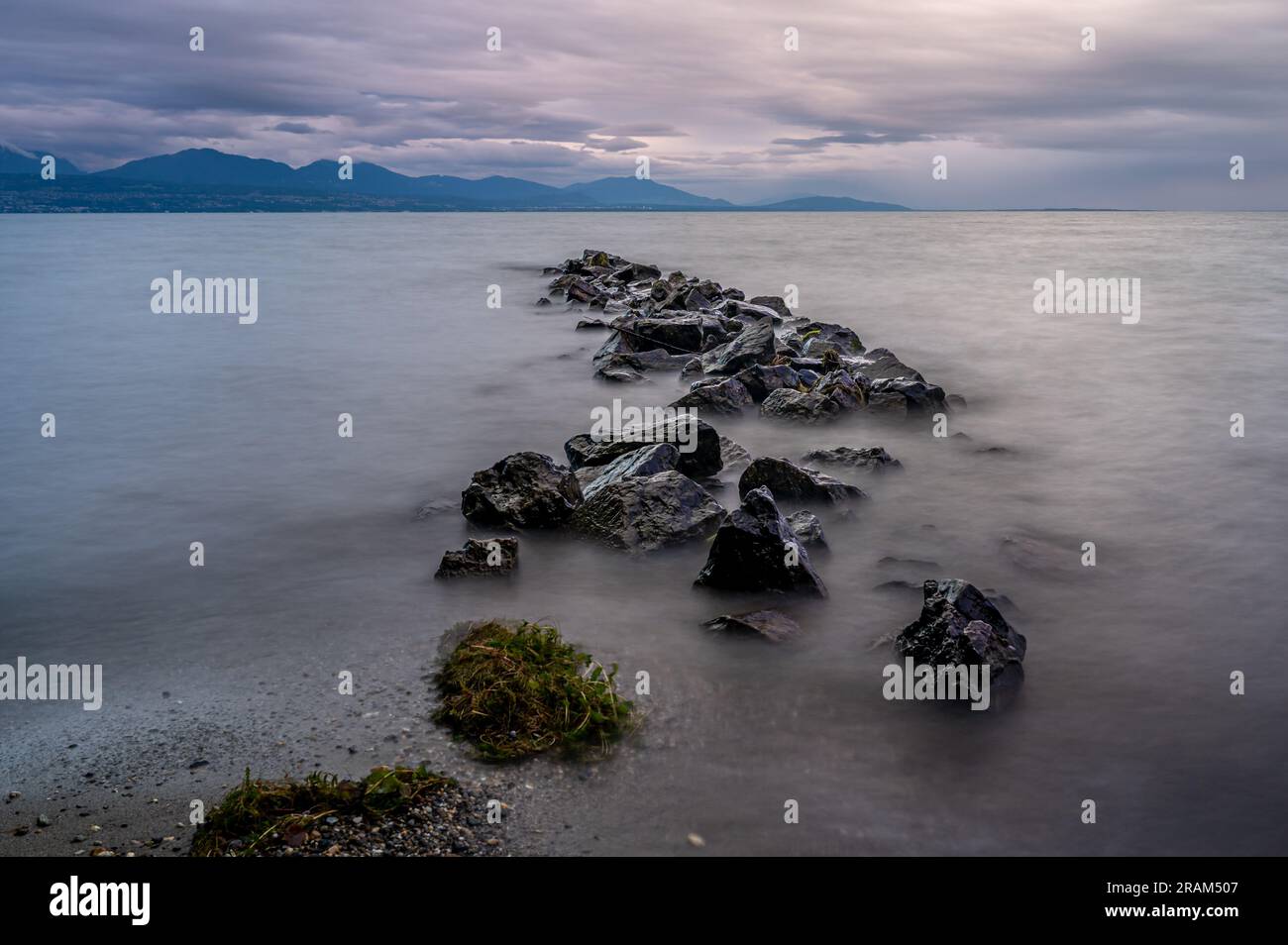 Landscape of water, mountain and rocks. Lausanne, Vaud Canton ...