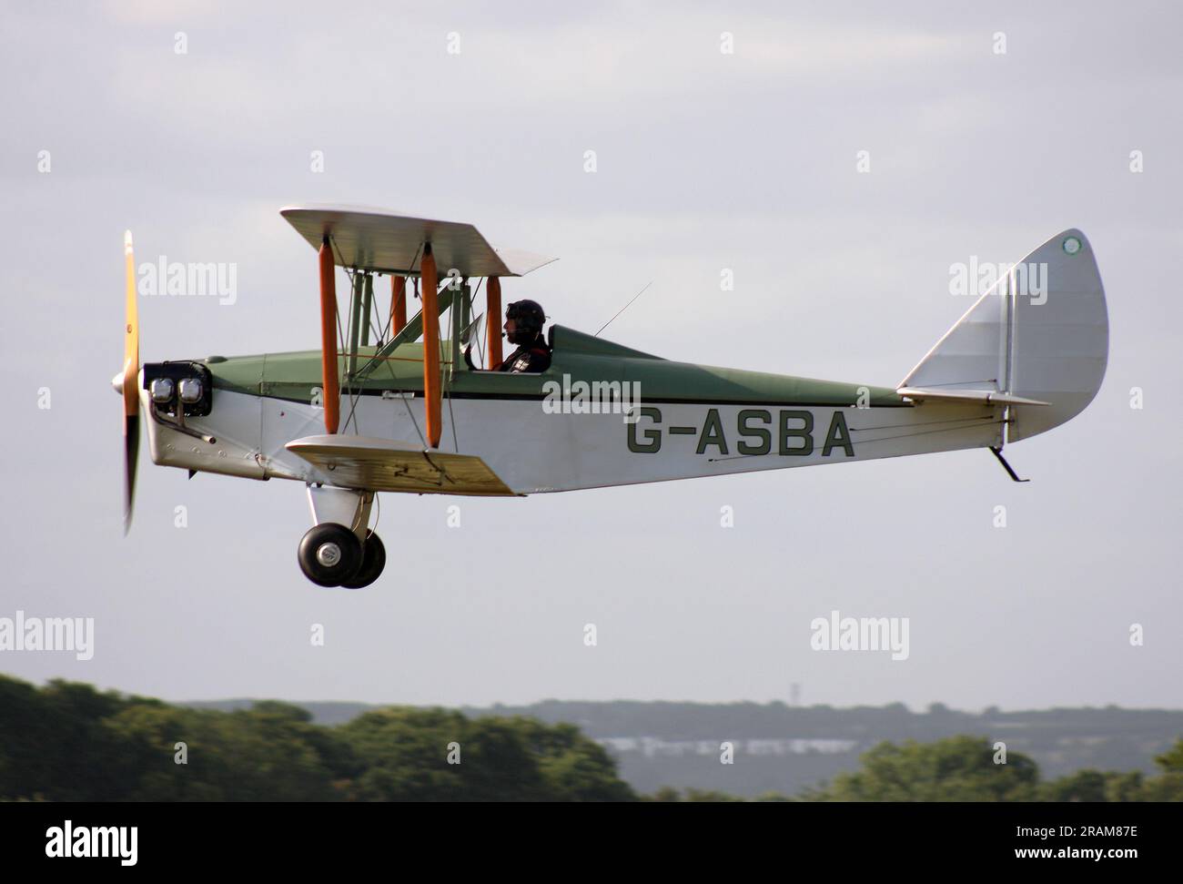 A Phoenix Currie Wot biplane departing Headcorn Aerodrome Kent England