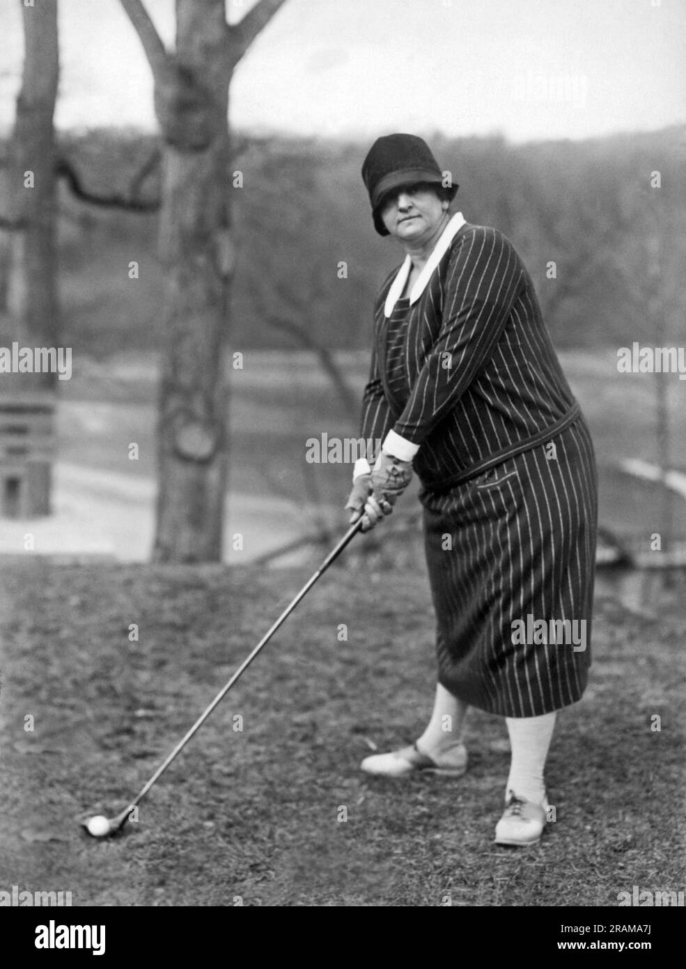 White Sulphur Springs, West Virginia:  March 16, 1927. A resident of New York plays golf while vacationing for the winter in West Virginia. Stock Photo