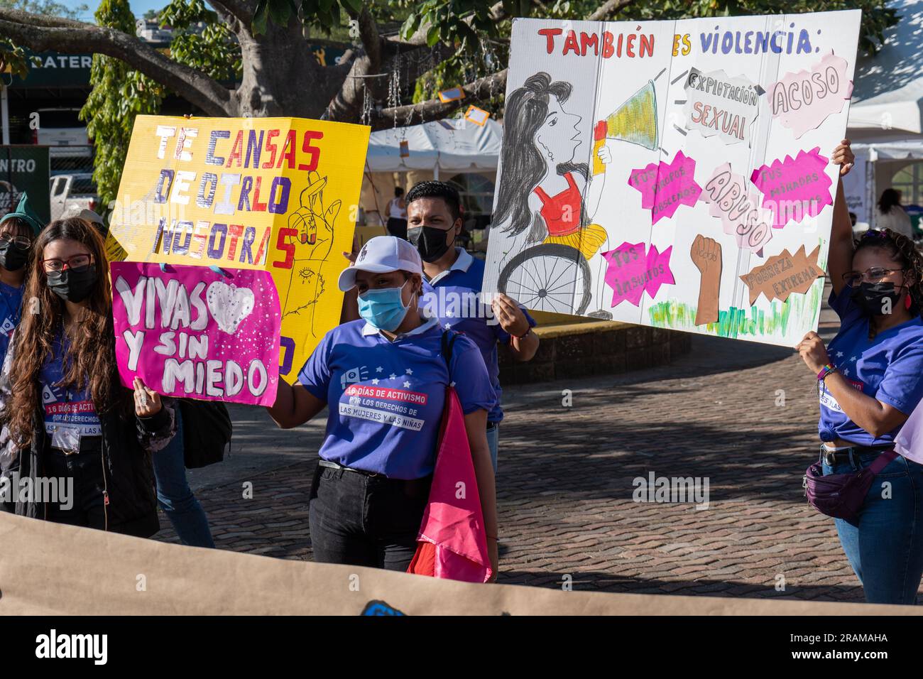 Tegucigalpa, Francisco Morazan, Honduras - November 25, 2022: Young Brown Women Hold Cardboard Signs at Protest for the International Day for the Elim Stock Photo