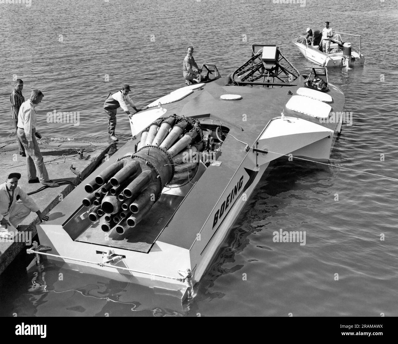 Seattle, Washington:  c. 1961. The Aqua-Jet on Lake Washington, a jet engine powered experimental speed boat made by Boeing. It is 38 feet long with a 17 foot beam, can reach speeds of 100 knots (115 mph), and is powered by an Allison J-3 turbojet with 4600 pounds of thrust. Stock Photo