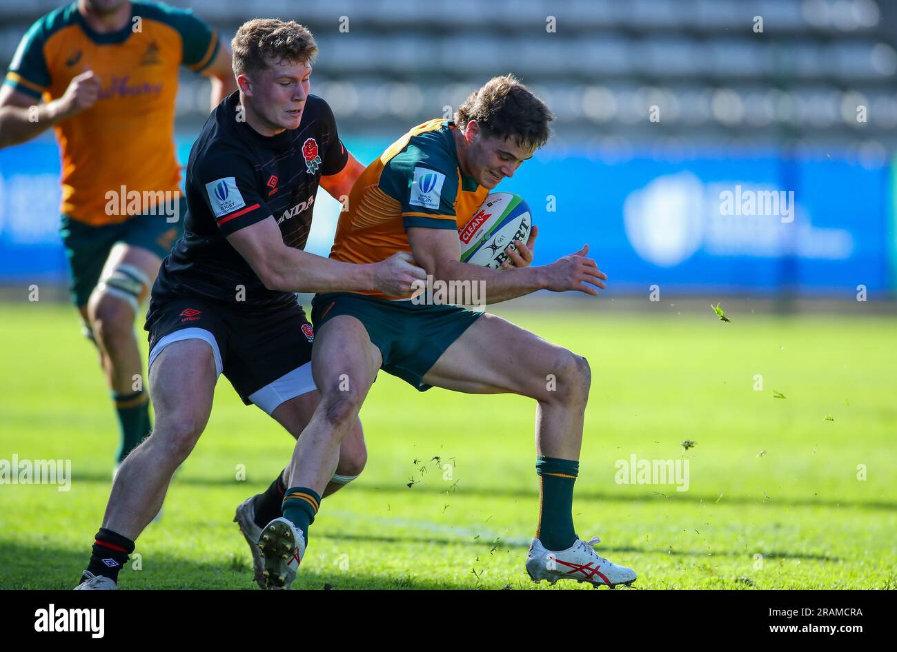Cape Town, SOUTH AFRICA - Tuesday 04 July 2023, Joe Woodward of England tackles Teddy Wilson of Australia during the World Rugby U20 Championship match between Australia and England at Athlone Stadium in Cape Town, South Africa. Stock Photo