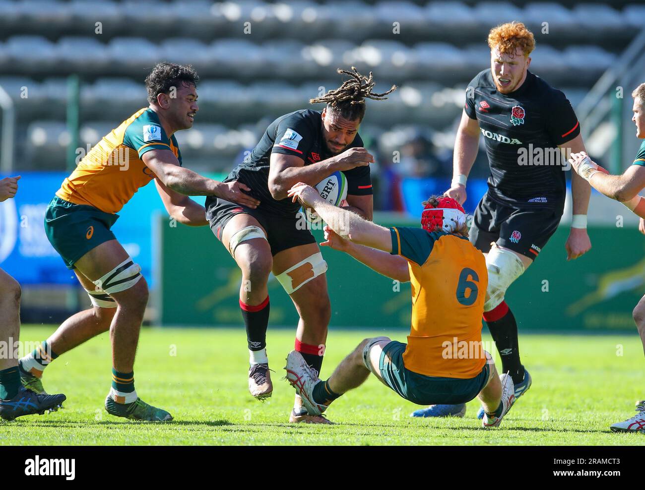 Cape Town, SOUTH AFRICA - Tuesday 04 July 2023, Chandler Cunningham-South runs over Lachlan Hooper of Australia during the World Rugby U20 Championship match between Australia and England at Athlone Stadium in Cape Town, South Africa. Stock Photo