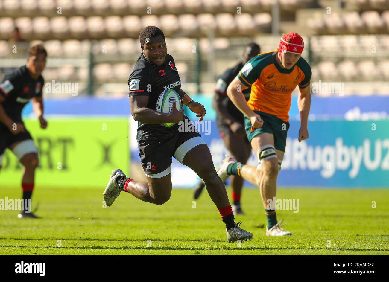 Cape Town, SOUTH AFRICA - Tuesday 04 July 2023, Nathan Jibulu of England breaks through the Australian defence during the World Rugby U20 Championship match between Australia and England at Athlone Stadium in Cape Town, South Africa. Stock Photo