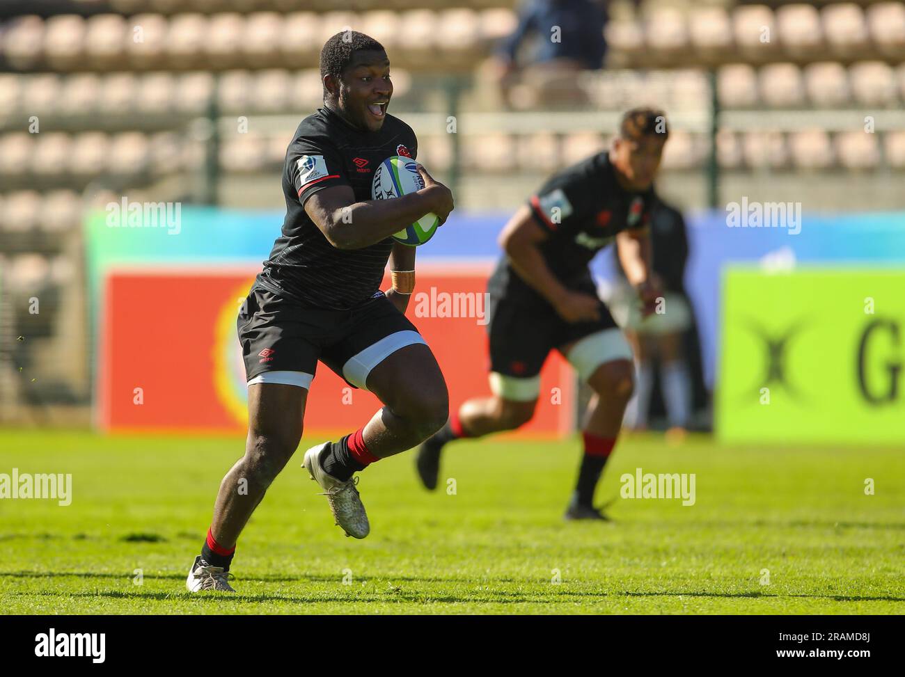 Cape Town, SOUTH AFRICA - Tuesday 04 July 2023, Nathan Jibulu of England breaks through the Australian defence during the World Rugby U20 Championship match between Australia and England at Athlone Stadium in Cape Town, South Africa. Stock Photo