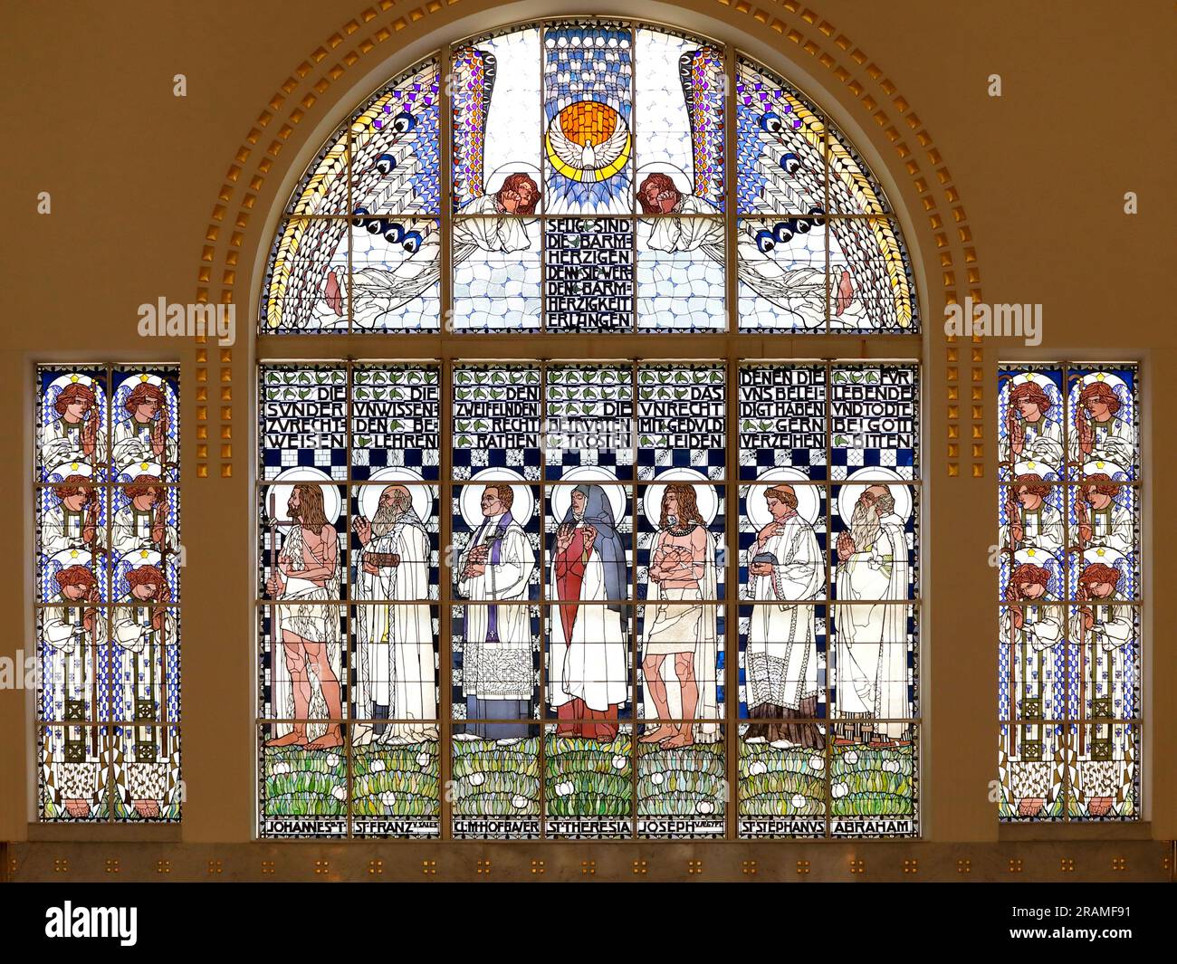 Stained glass window depicting Christian ideas and teachings in the Church of St. Leopold am Steinhof, Vienna Stock Photo