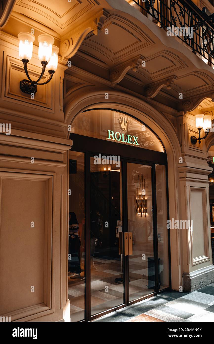 Facade of Rolex watch store in famous shopping mall GUM. Golden crown,  bright green logo. Rolex is a worldwide luxury watch brand relying on 4,000  wat Stock Photo - Alamy