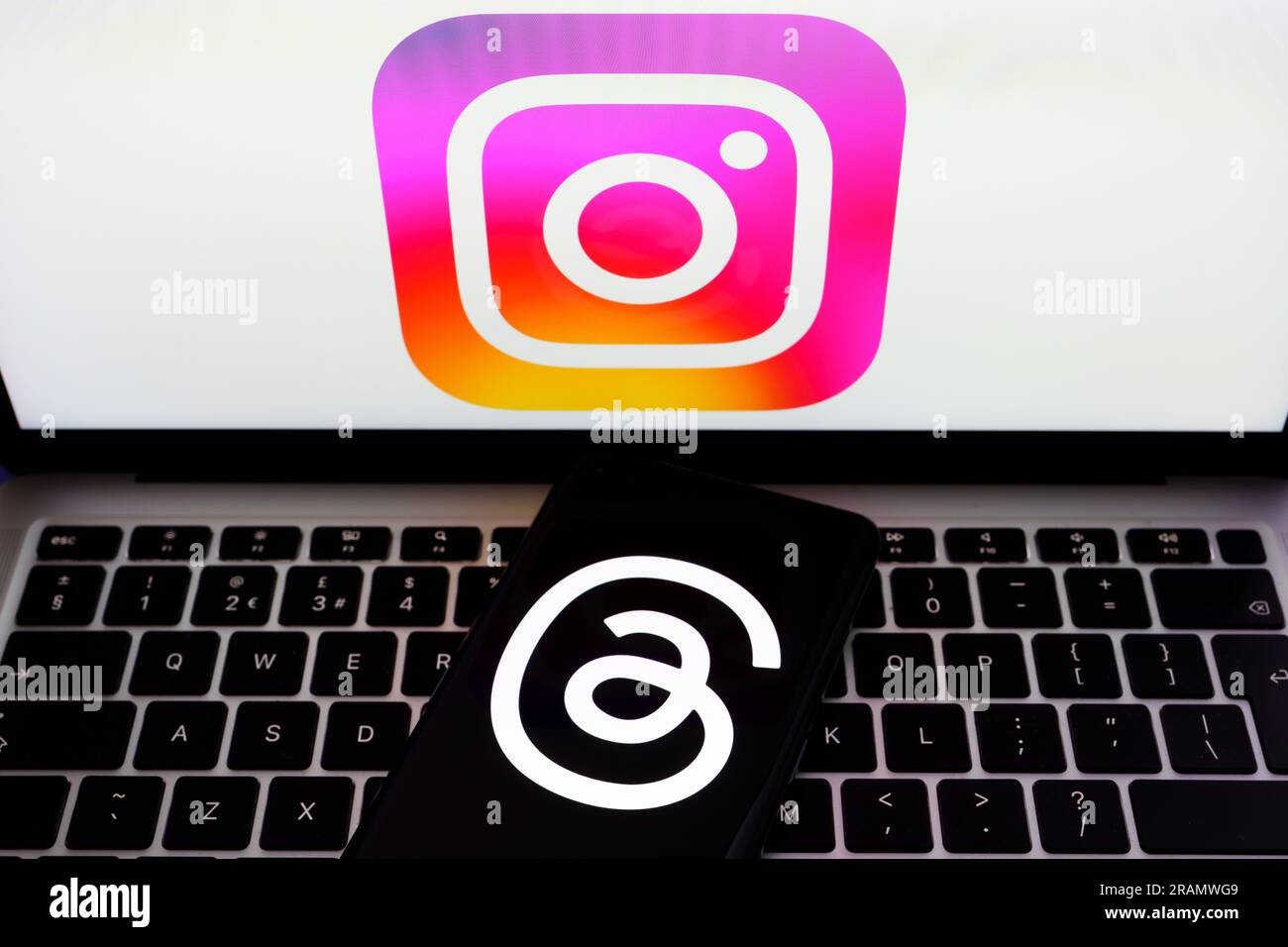Instagram and Threads app logos seen on screens. Instagram Threads app is a micro blogging platform, developed by Facebook Meta. Stafford, United King Stock Photo