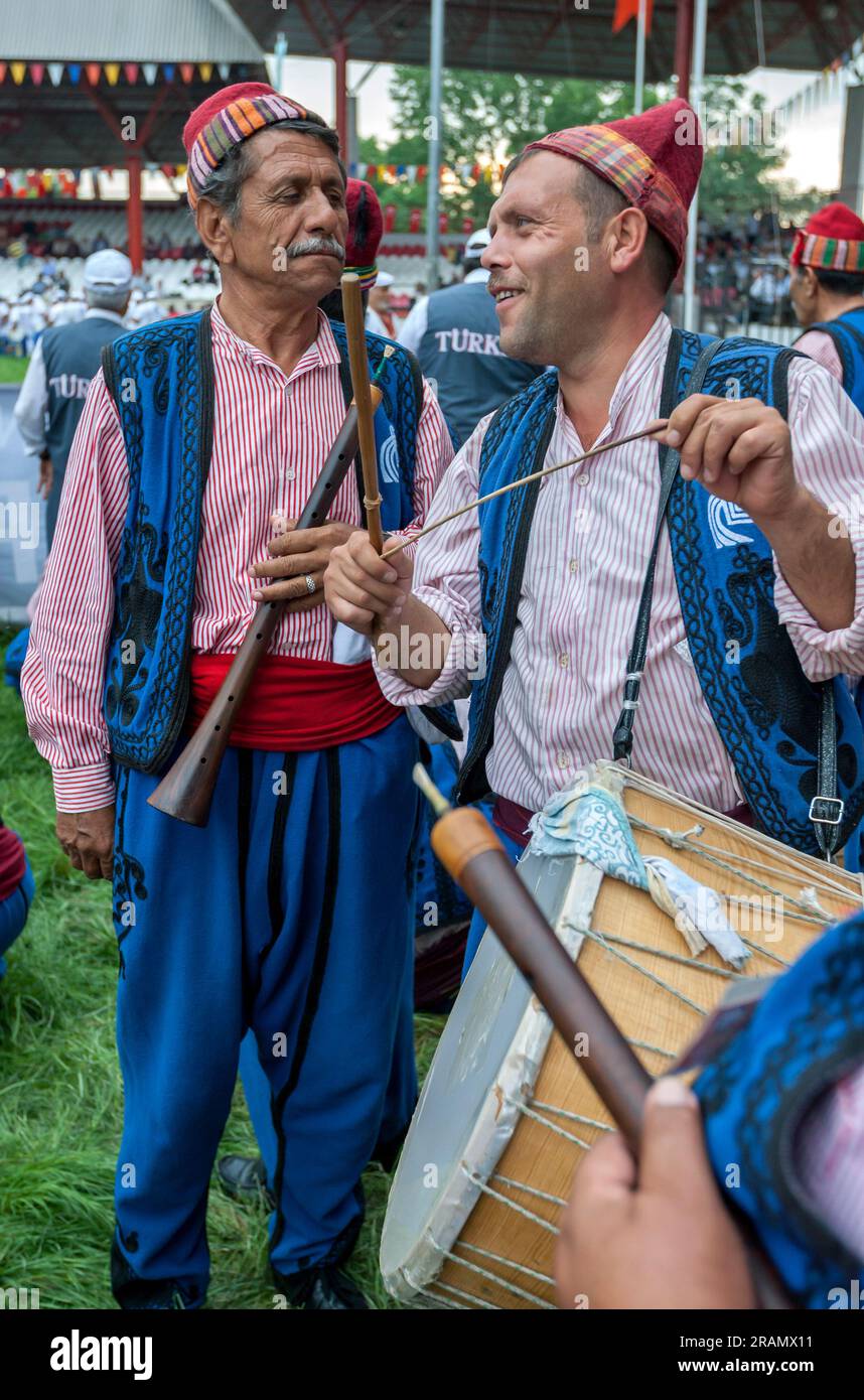 Romanlar musicians holding a zurna and drums wait for the procession of