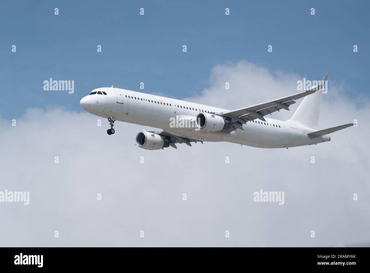 White passenger plane taking off in Turkey Stock Photo