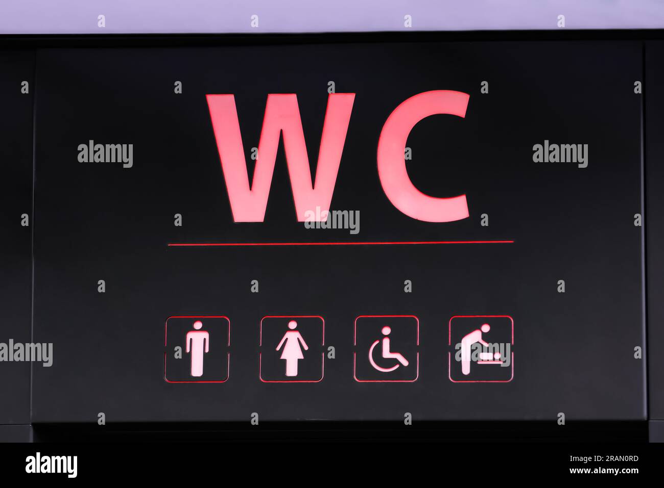 Sign of public toilet with different symbols Stock Photo