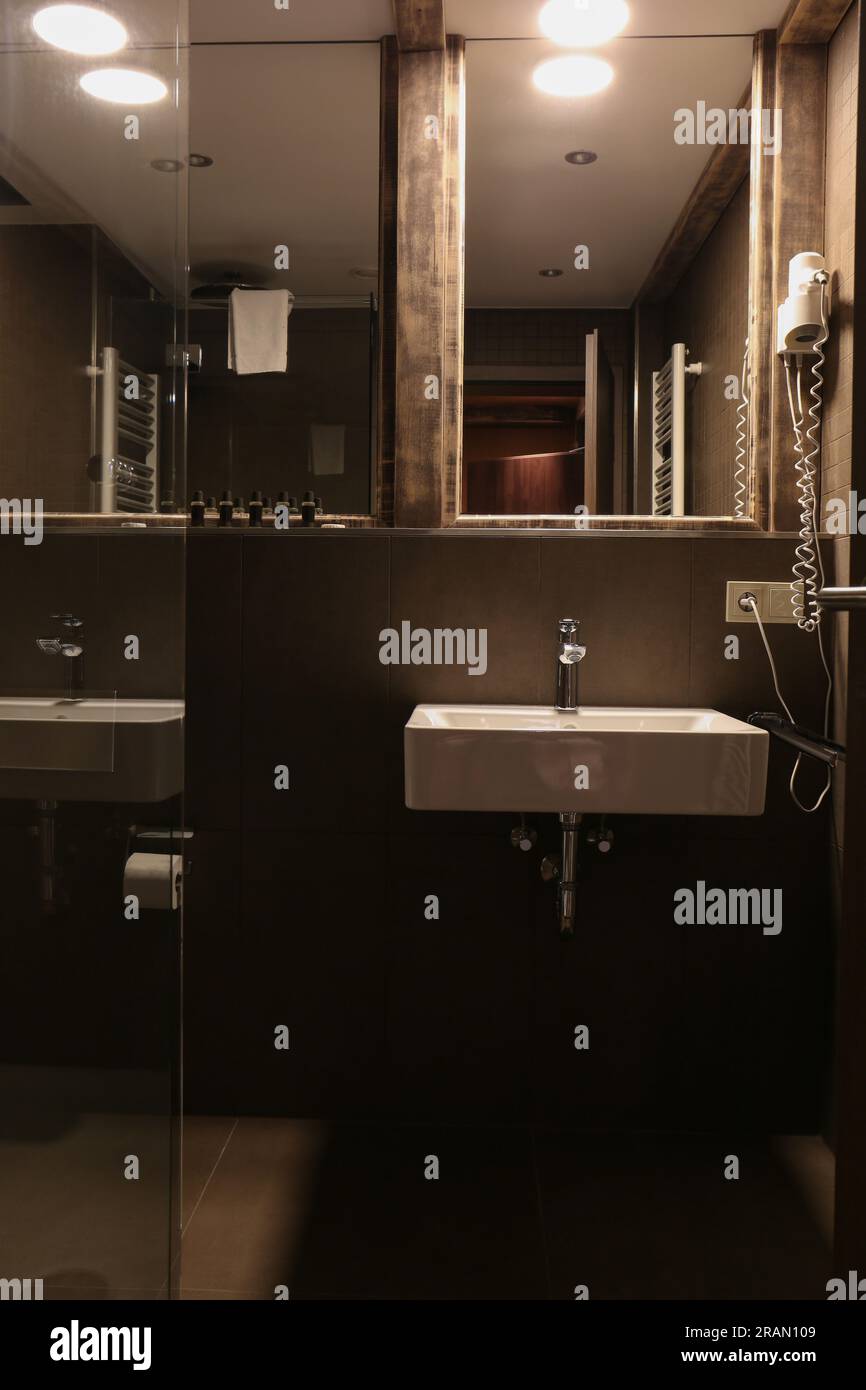 Stylish bathroom with sink in luxury hotel. Interior design Stock Photo ...