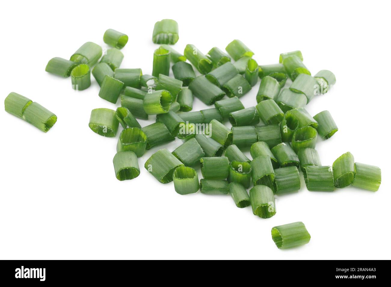 Chopped fresh green onions on white background Stock Photo - Alamy