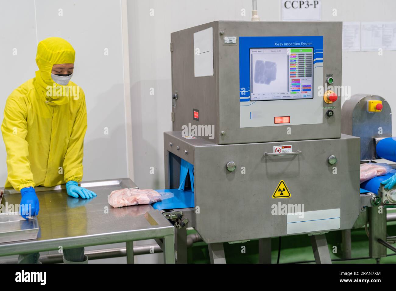 X ray machine inspection chicken meat for detect metal in product. food