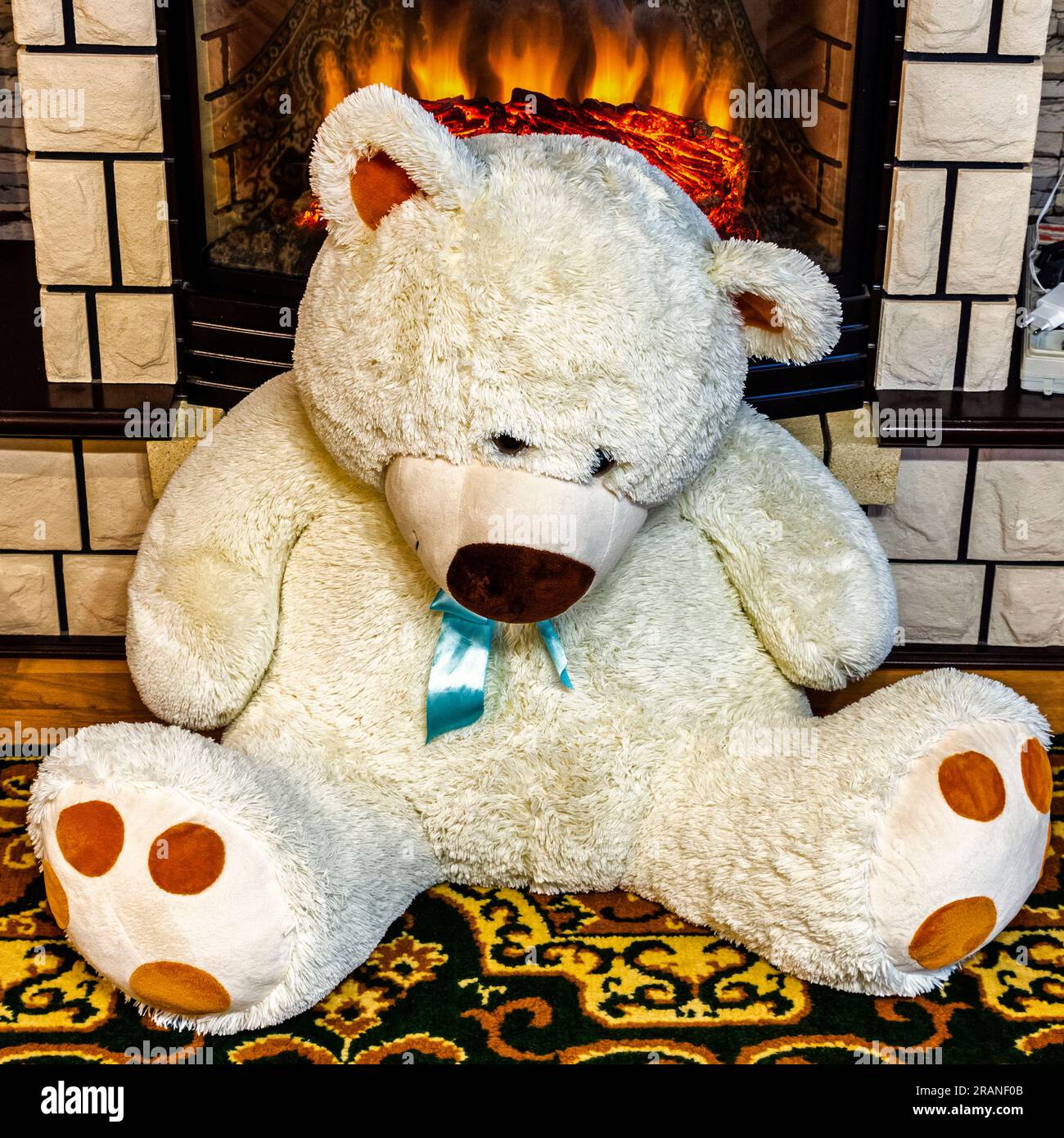 friendly good cream teddy bear with big eyes Stock Photo - Alamy