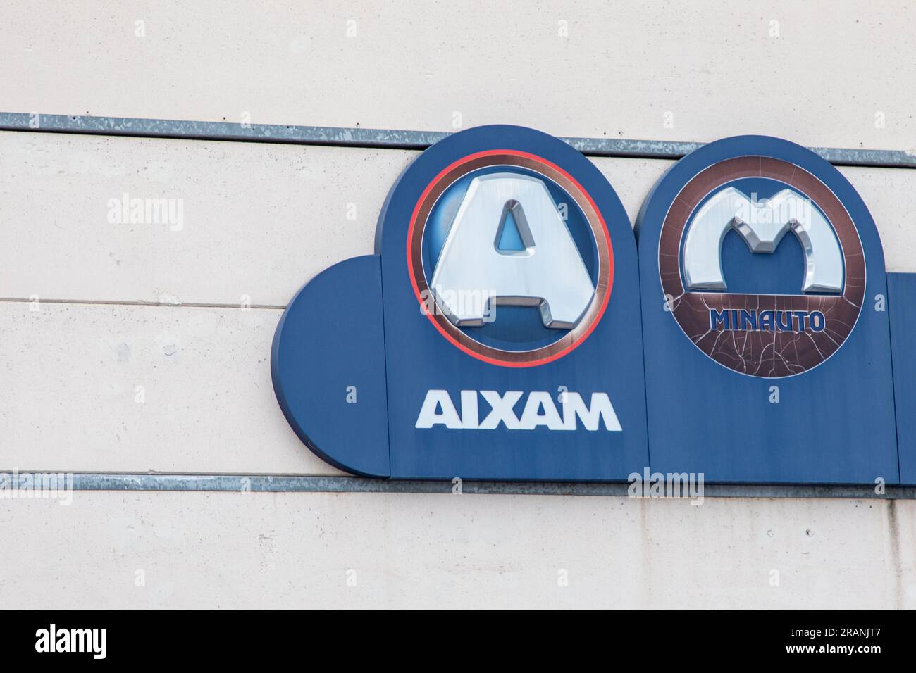 Bordeaux , France - 07 01 2023 : Aixam minauto dealership shop logo brand and text sign wall part of microcar car Mega of French automobile manufactur Stock Photo