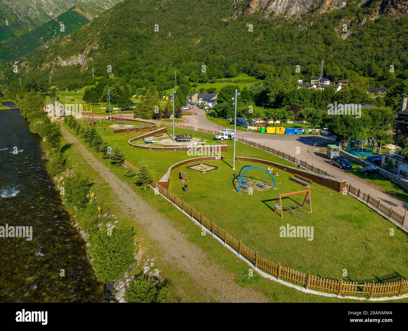 Aerial view of the children's area of the town of Barruera next to the Noguera de Tor river, in the Boí Valley (Lleida, Catalonia, Spain, Pyrenees) Stock Photo