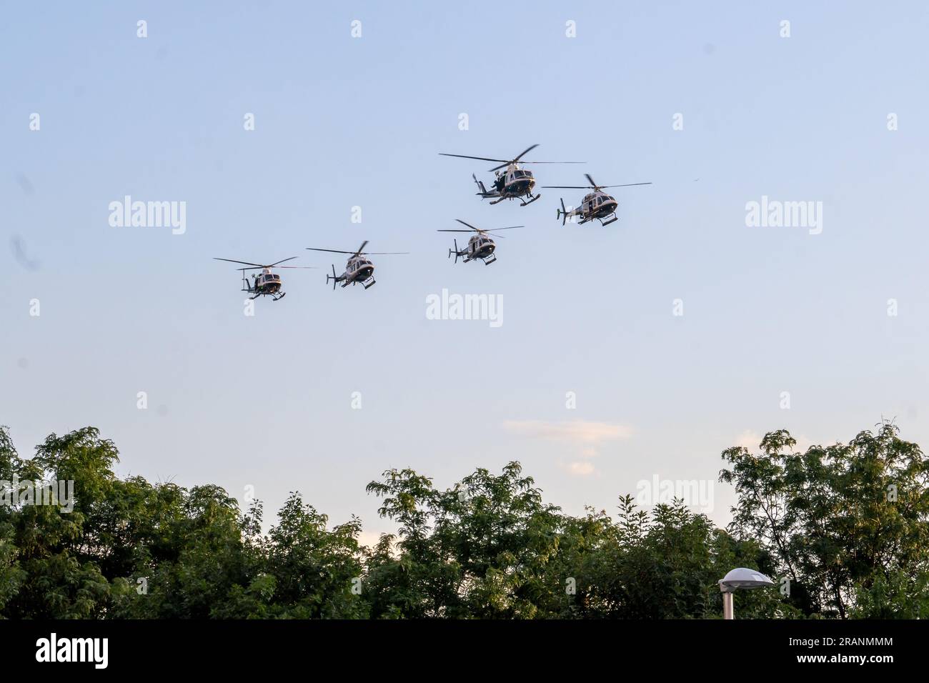 New York, United States. 04th July, 2023. NEW YORK, NY - JULY 04: A New York Police Department (NYPD) helicopters perform a flyover during the annual Macys 4th of July Fireworks display overlooking the Manhattan skyline at Gantry State Plaza Park in Long Island City on July 4th, 2023 in the Queens borough of New York City. Credit: Ron Adar/Alamy Live News Stock Photo