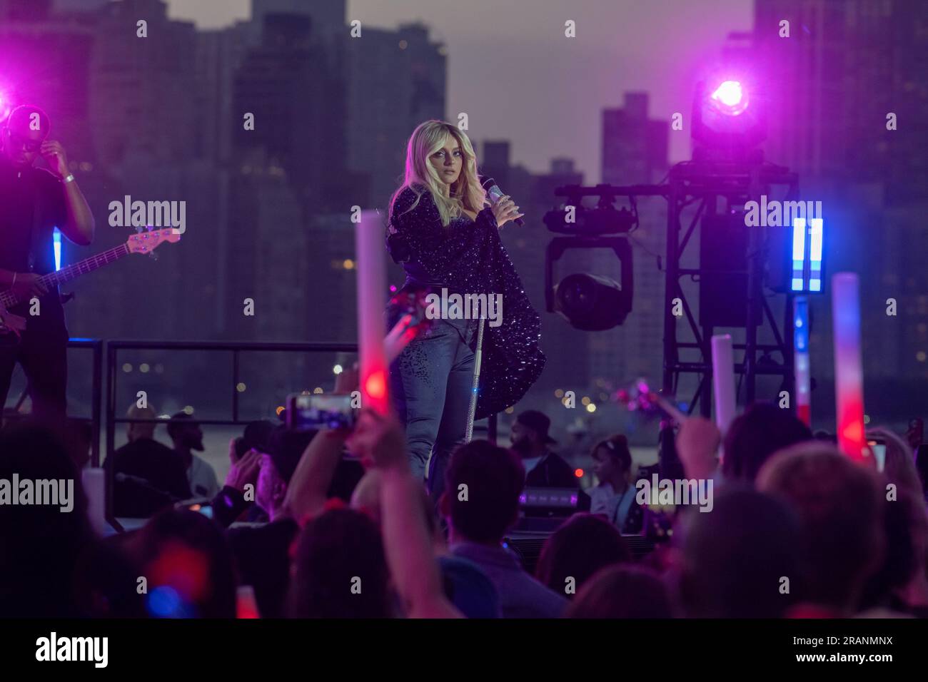 New York, United States. 04th July, 2023. NEW YORK, NY - JULY 04: Bebe Rexha performs during the annual Macy's 4th of July Fireworks display overlooking the Manhattan skyline at Gantry State Plaza Park in Long Island City on July 4th, 2023 in the Queens borough of New York City. Credit: Ron Adar/Alamy Live News Stock Photo