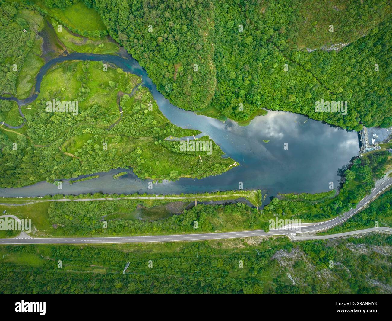 Aerial zenithal view of the Cardet reservoir, in the Vall de Boí valley, in spring (Alta Ribagorça, Lleida, Catalonia, Spain, Pyrenees) Stock Photo