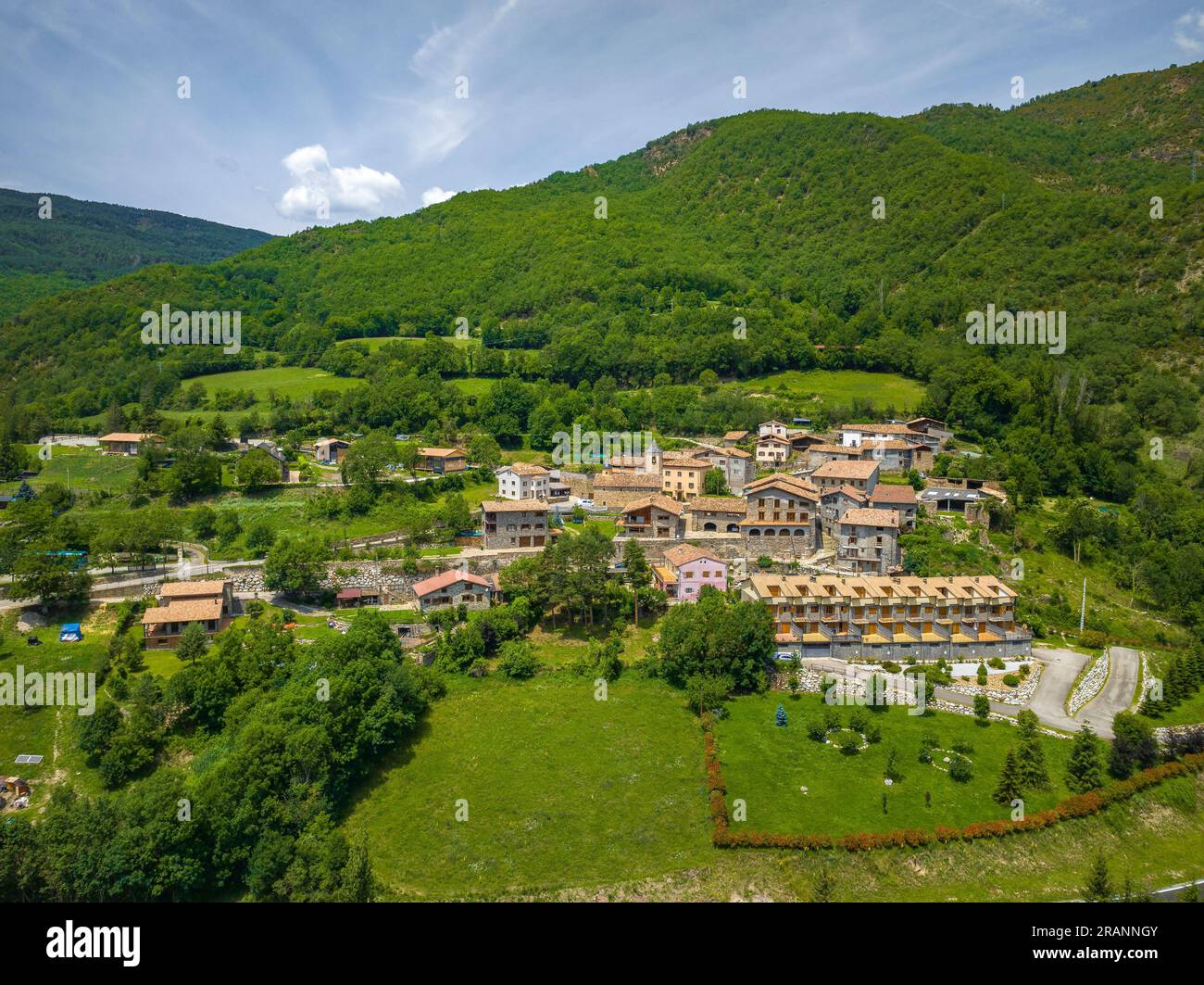 Aerial view of the town of Llesp in the Boí Valley and its spring surroundings (Alta Ribagorça, Lleida, Catalonia, Spain, Pyrenees) Stock Photo