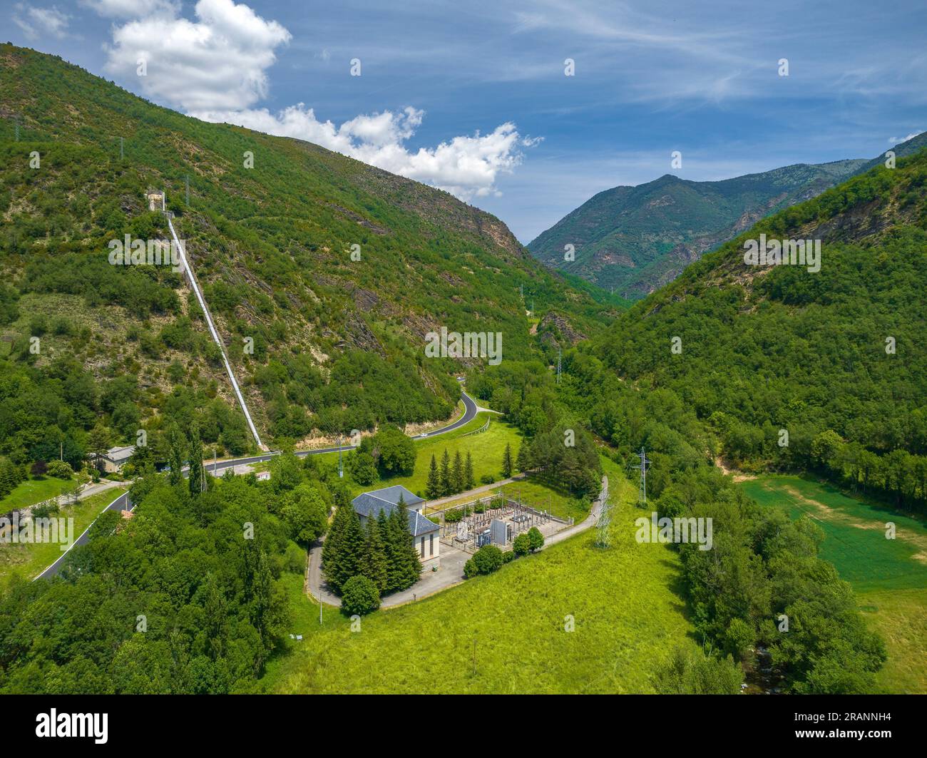 Aerial view of the town of Llesp in the Boí Valley and its spring surroundings (Alta Ribagorça, Lleida, Catalonia, Spain, Pyrenees) Stock Photo