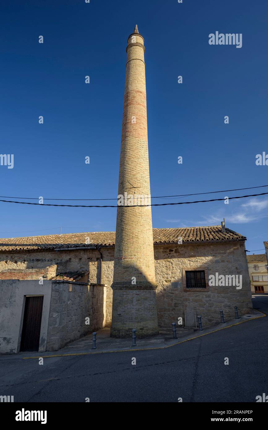 Chimney of the old MIralcamp oil mill (Pla d'Urgell, Lleida, Catalonia, Spain) ESP: Chimenea del antiguo molino de aceite de MIralcamp. Lérida, España Stock Photo