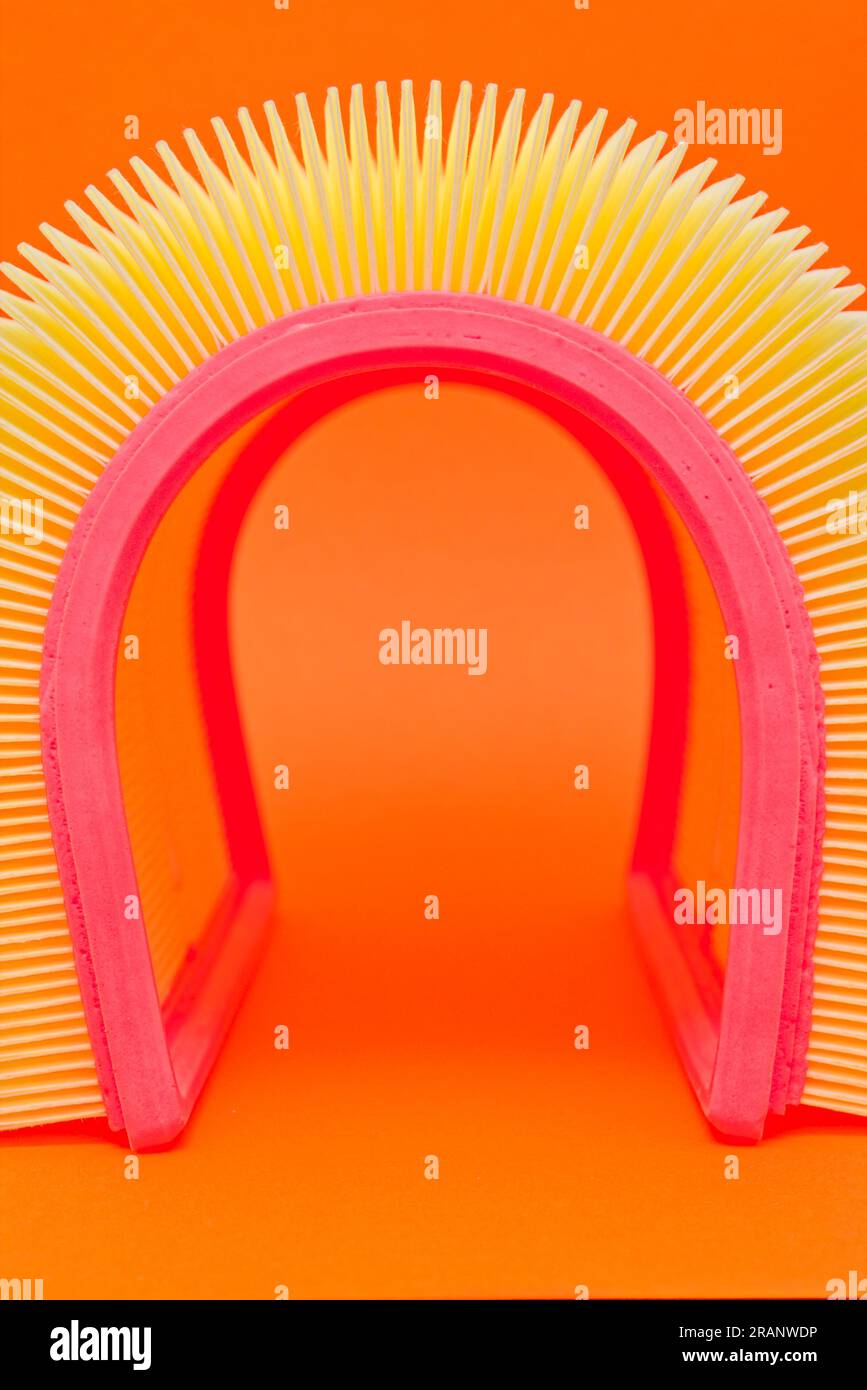 An abstract image of the air new filter. Orange background Stock Photo ...