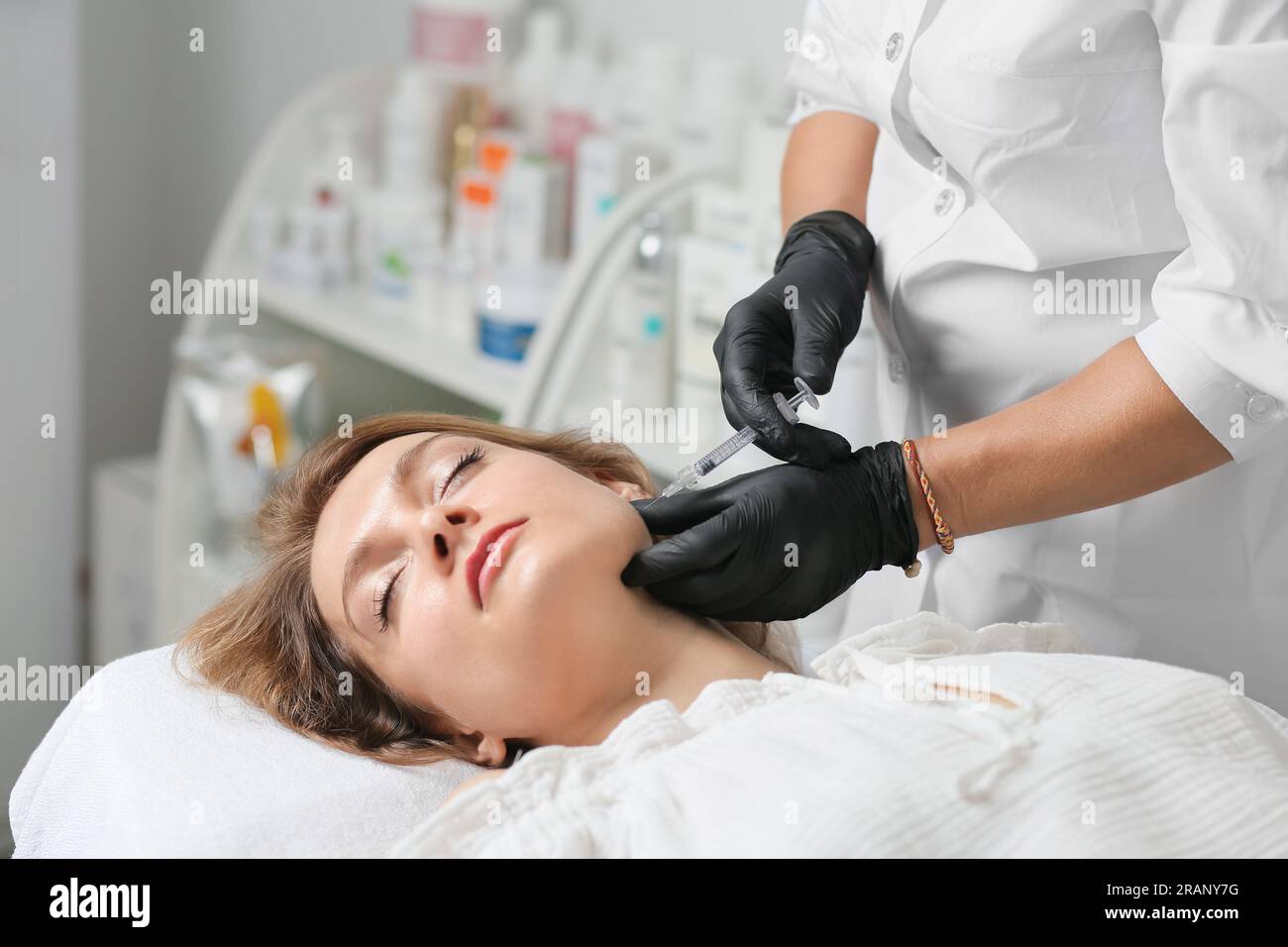 Face treatments. The concept of maintaining health, youth and beauty. Modern cosmetology, beautician tools. Beauty techniques. Facial mesotherapy. Stock Photo