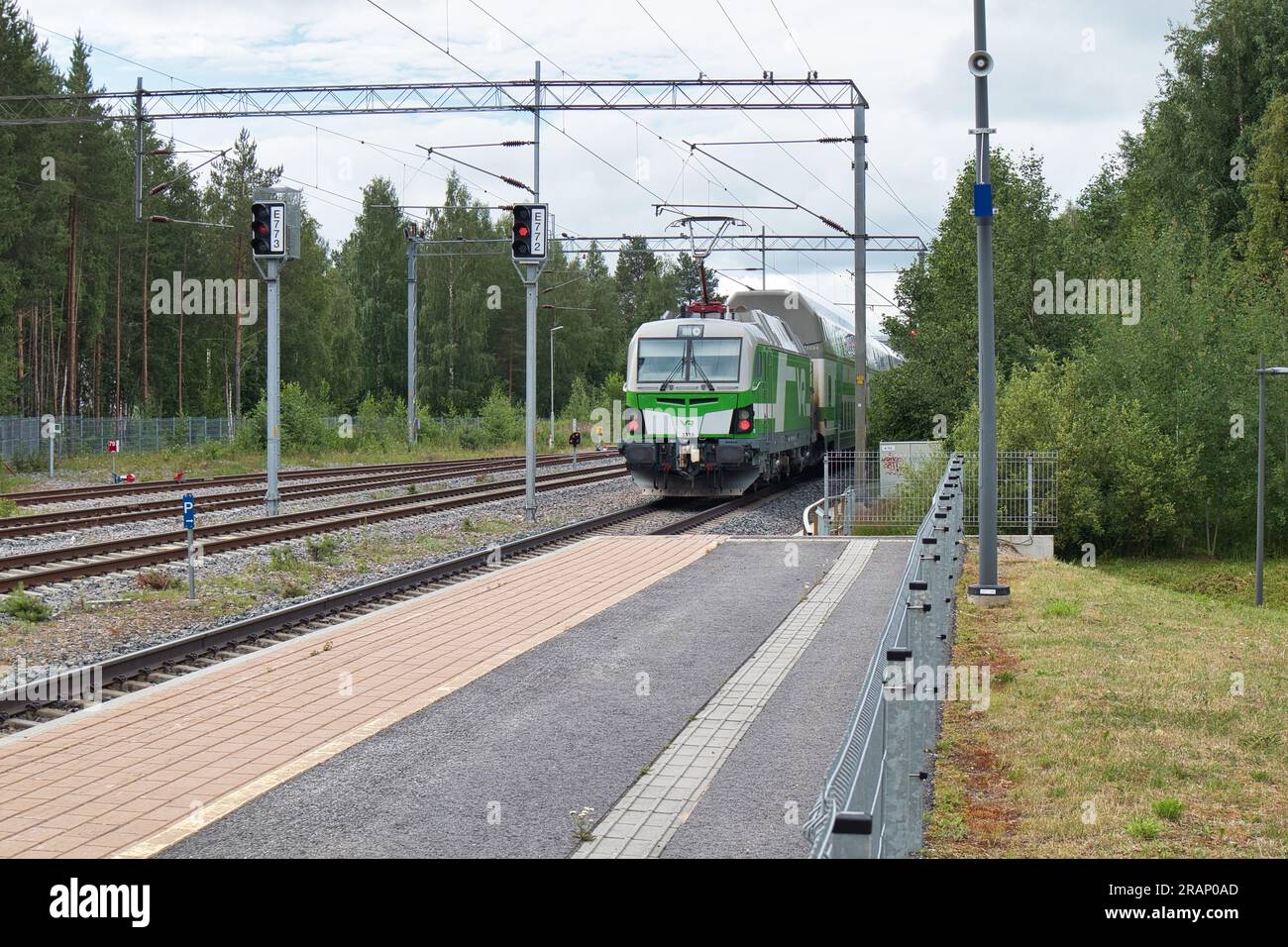 Intercity train leaving the Kempele railway station, Finland Stock Photo