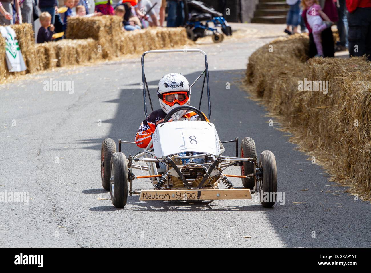 Competitor near the finish of a downhill soapbox race in Framlingham a Suffolk markettown. Stock Photo