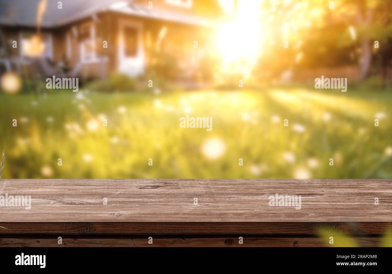 a wooden table space with home backyard, blurred background for advertising template Stock Photo