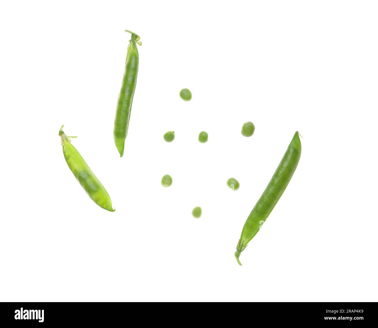 Flying green pea pods on white background Stock Photo Alamy