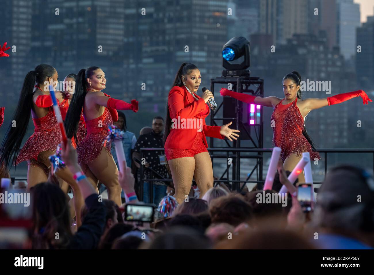 New York, United States. 04th July, 2023. Ashanti performs during the annual Macy's 4th of July Fireworks display overlooking the Manhattan skyline at Gantry State Plaza Park in Long Island City in the Queens borough of New York City. Credit: SOPA Images Limited/Alamy Live News Stock Photo