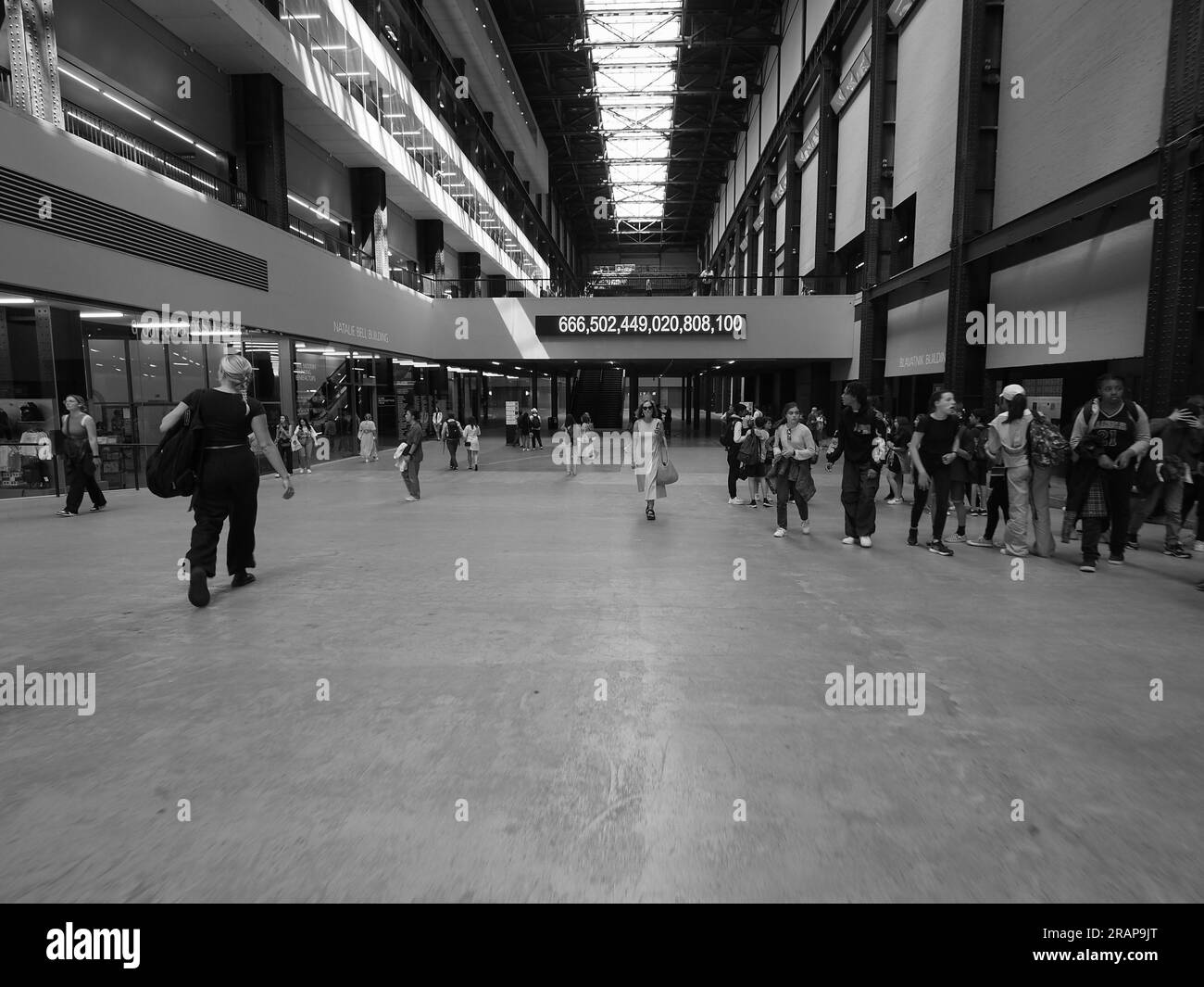LONDON, UK - JUNE 08, 2023: Tate Modern turbine hall in South Bank power station in black and white Stock Photo