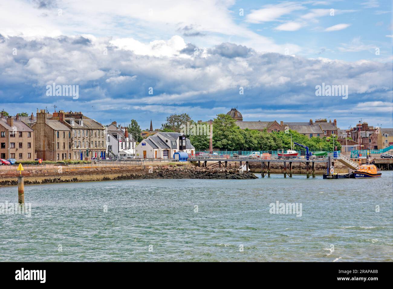 Montrose Scotland River South Esk the harbour Wharf street  houses and RNLI Lifeboat Station Stock Photo