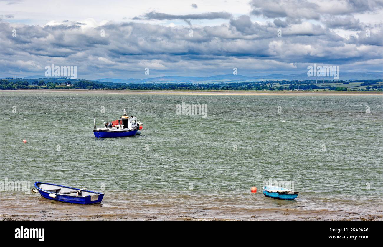 Montrose Scotland small fishing boats and view over the Montrose Basin at low tide early summer Stock Photo