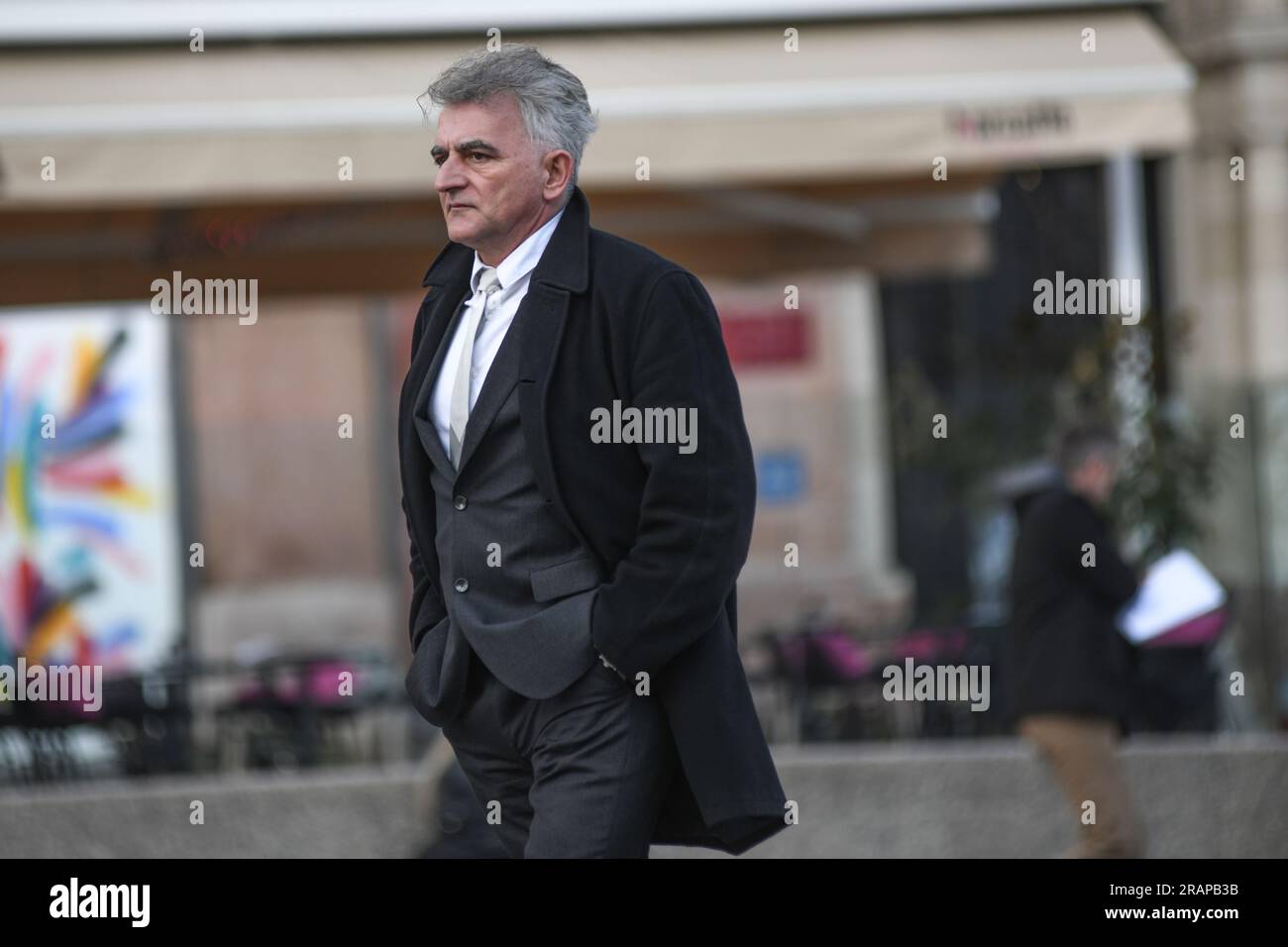 Senior man walking on Ban Jelacic Square, Zagreb, Croatia Stock Photo