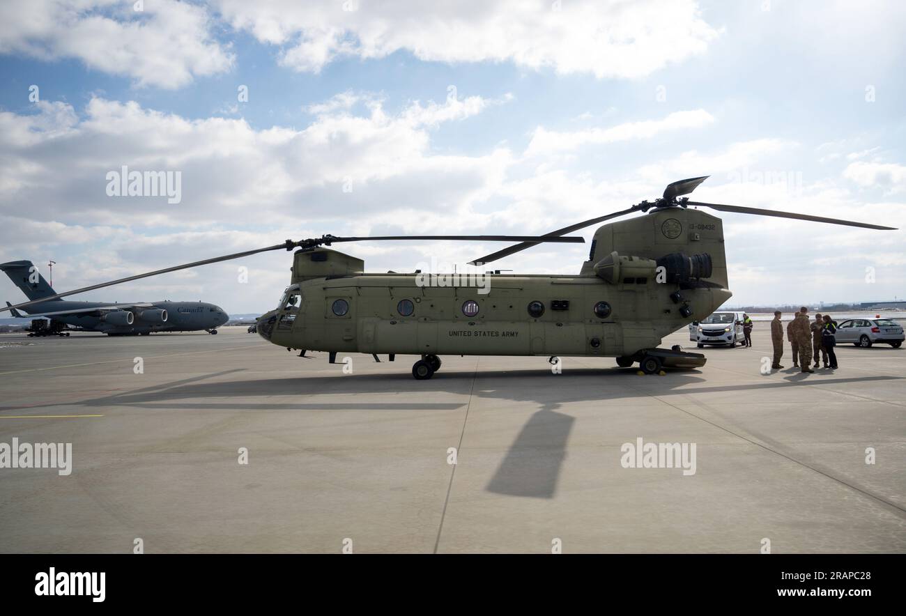 FILED - 10 March 2022, Poland, Rzeszow: A U.S. Army Boeing CH-47 Chinook helicopter stands at Rzeszow Airport. The defense committee of the German parliament has given the green light for the multi-billion dollar purchase of 60 heavy transport helicopters for the German Armed Forces. A majority of expert politicians voted in favor of the procurement of 60 Boeing CH-47F Chinook helicopters in Berlin on Wednesday, according to participants at the meeting. Photo: Christophe Gateau/dpa Stock Photo