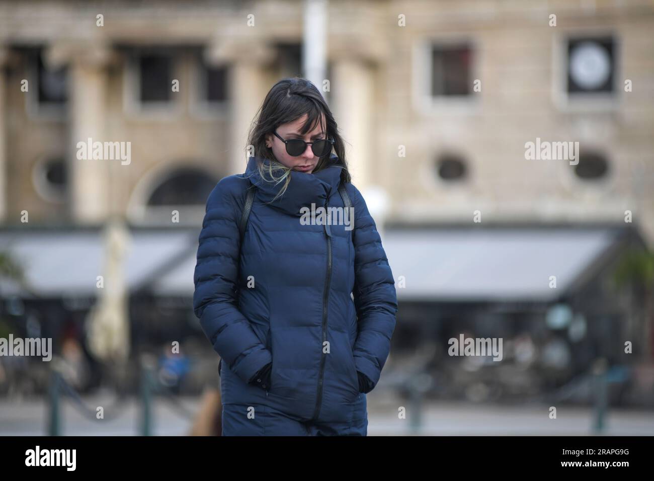 Croatian woman walking on Ban Jelacic Square, Zagreb, Croatia Stock Photo