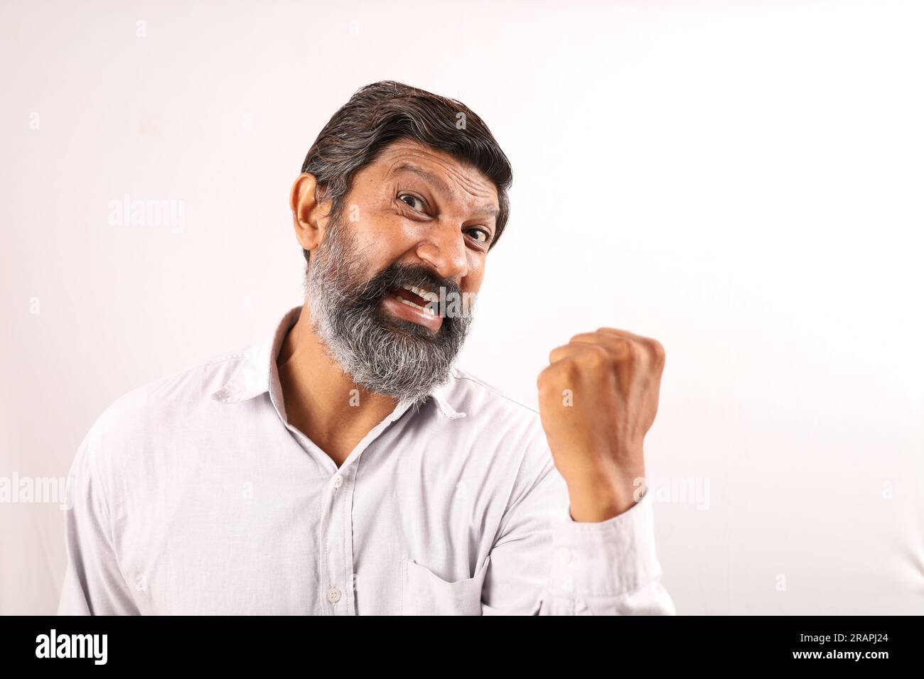 Executing Things Portrait of Indian bearded man wearing shirt. Funky expressions ...