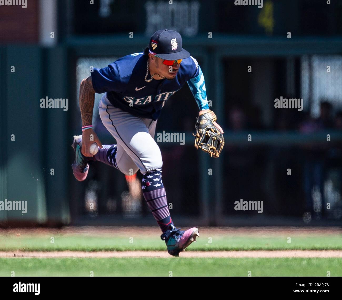 Seattle Mariners second baseman Kolten Wong runs out onto the field before  a baseball game against the St. Louis Cardinals, Sunday, April 23, 2023, in  Seattle. (AP Photo/Lindsey Wasson Stock Photo - Alamy