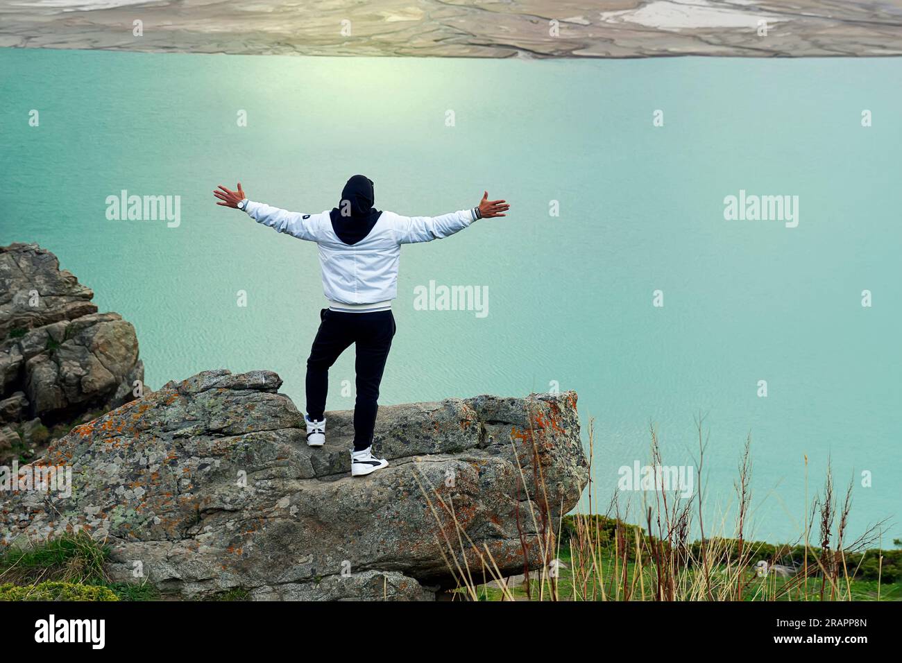 Tourist travel man stands arms hi-res stock photography and images - Alamy